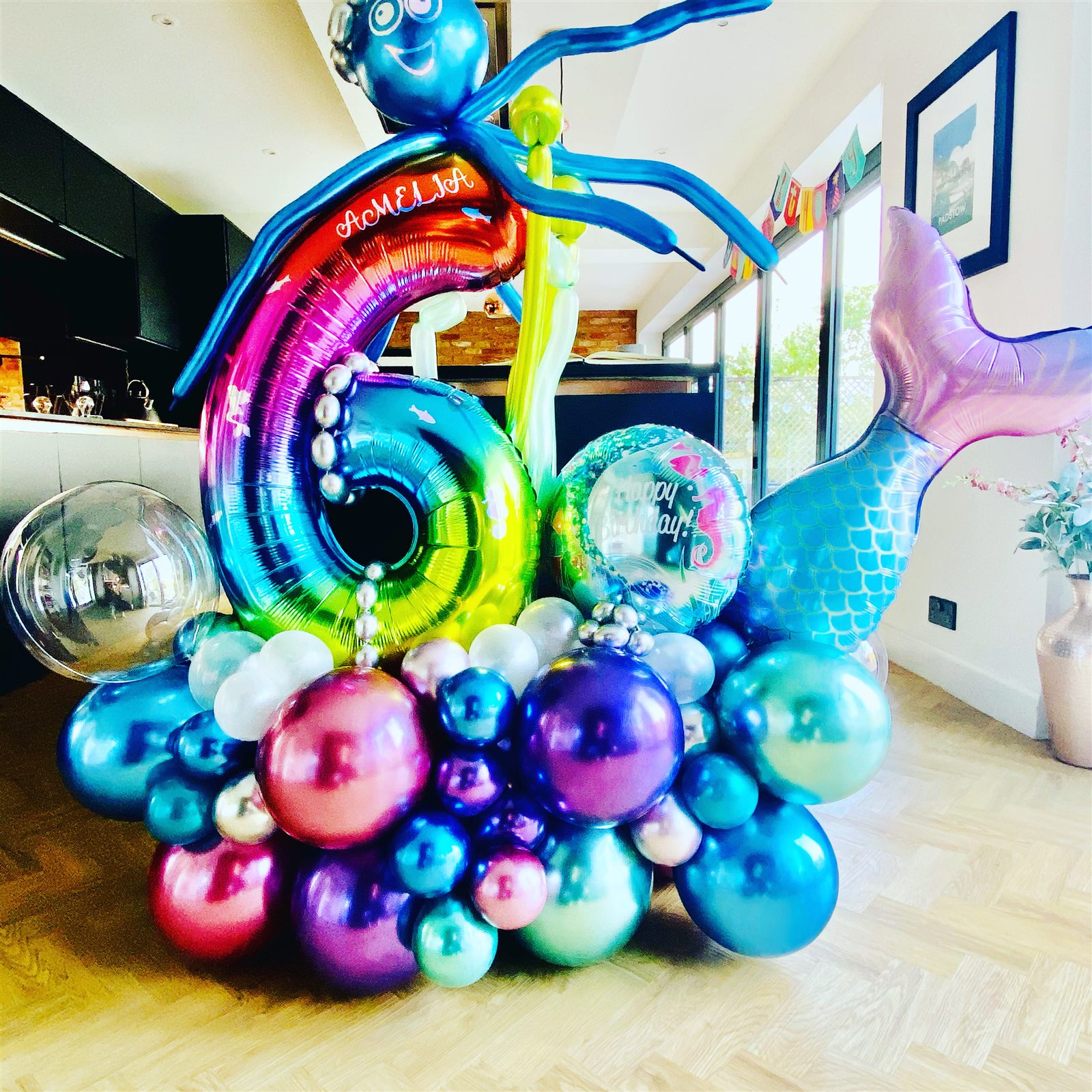 Mermaid themed rainbow number 6 balloon stack with chrome base