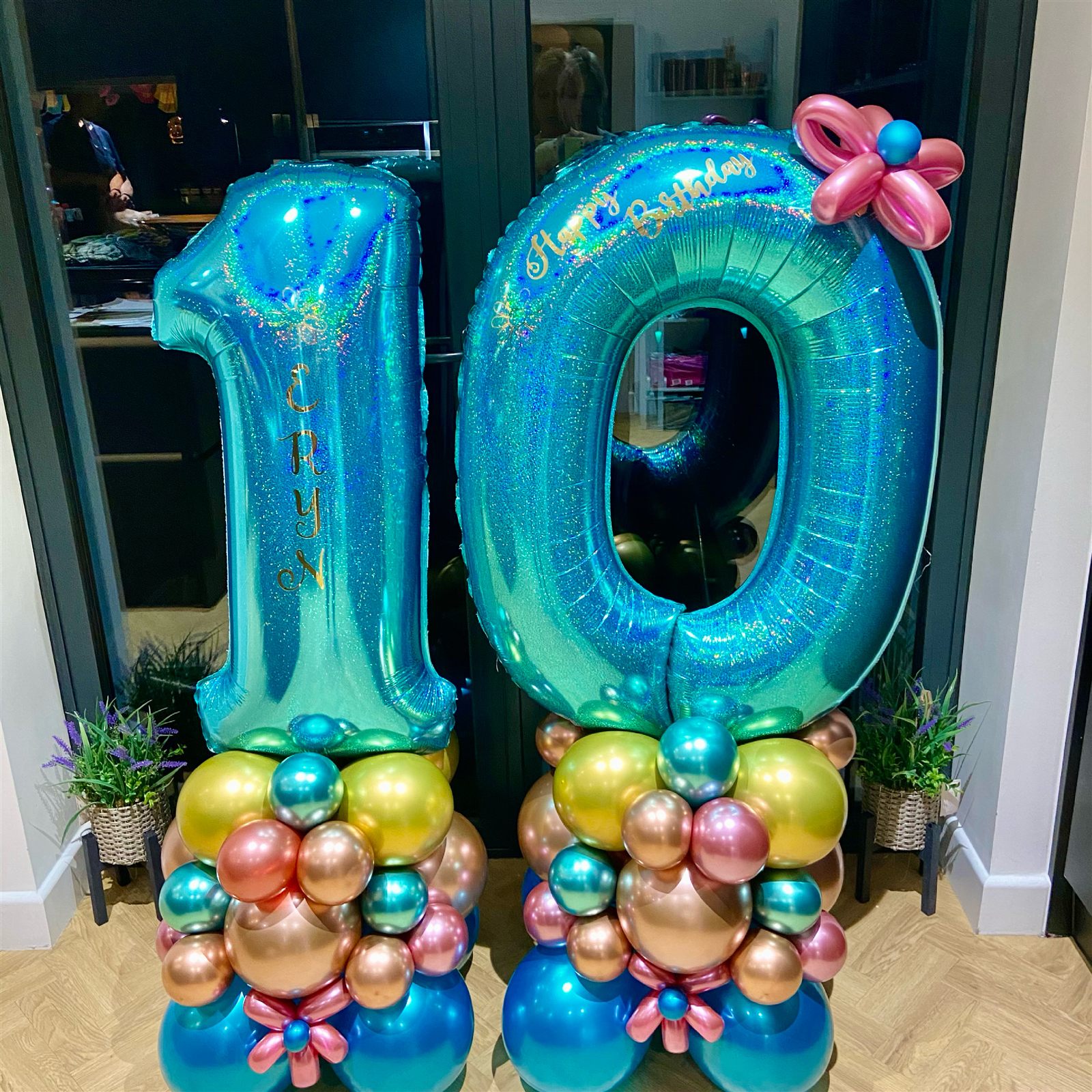 Holographic teal number 10 twin balloon stacks
