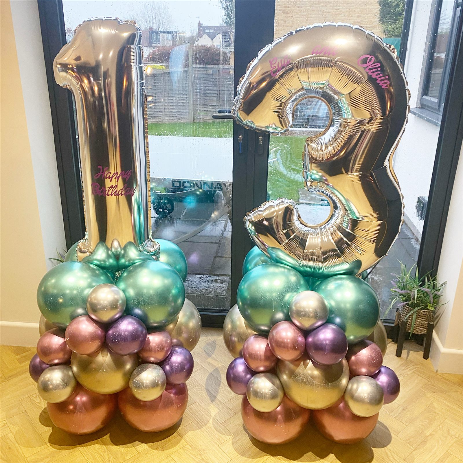Rose gold and chrome number 13 twin balloon stacks